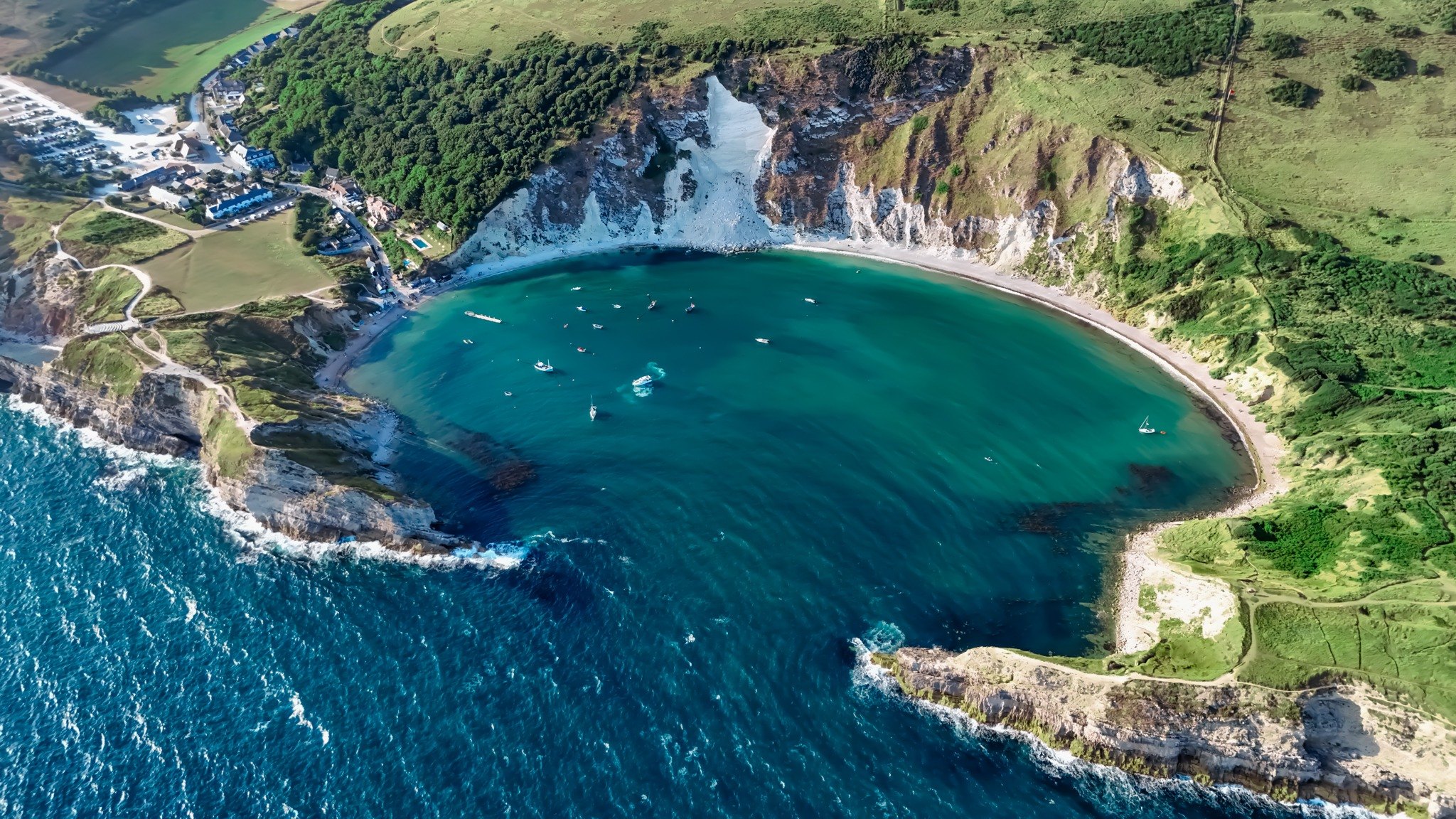 Aerial view of a crescent-shaped cove